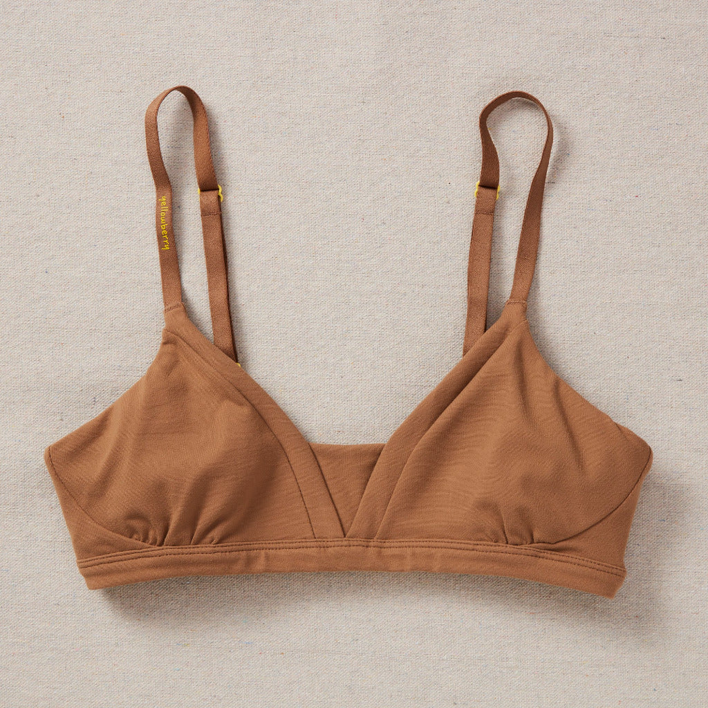 Styled detail image of Yellowberry Wish Bra in mocha. The Wish Bra is double-layered and fully lined to ensure full coverage. Softest fabrics, AND made by a female founded company.