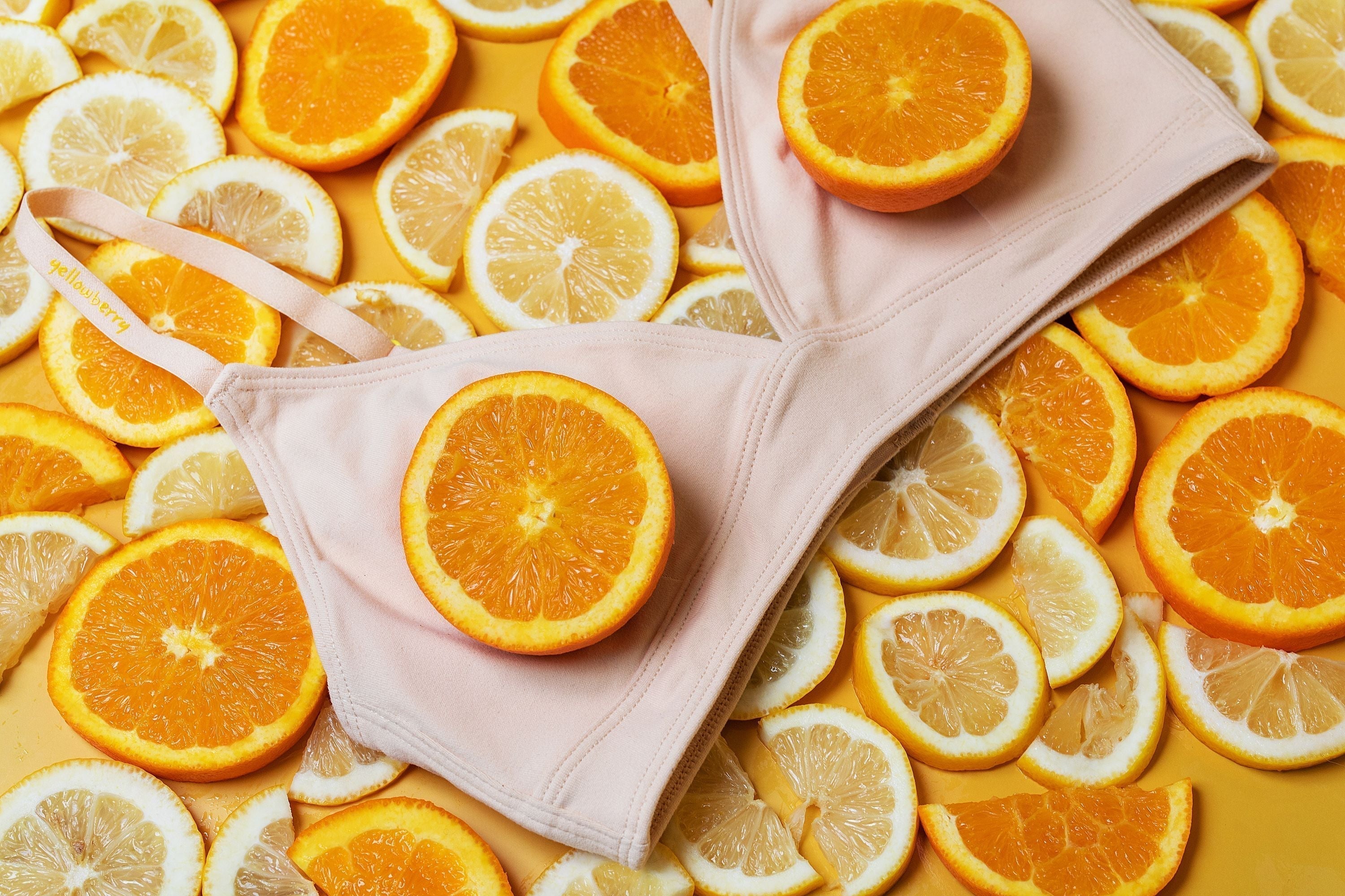 A Yellowberry Lily Bra displayed with fruit