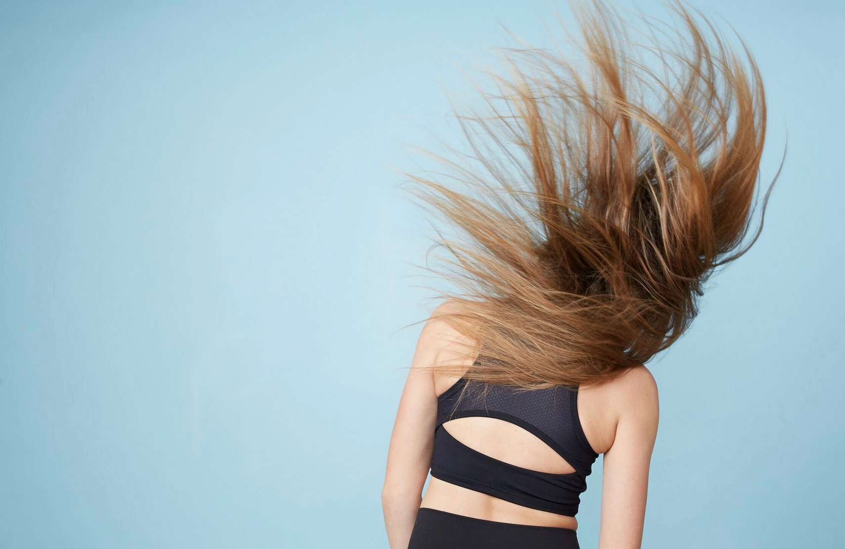 Girl flipping her hair 