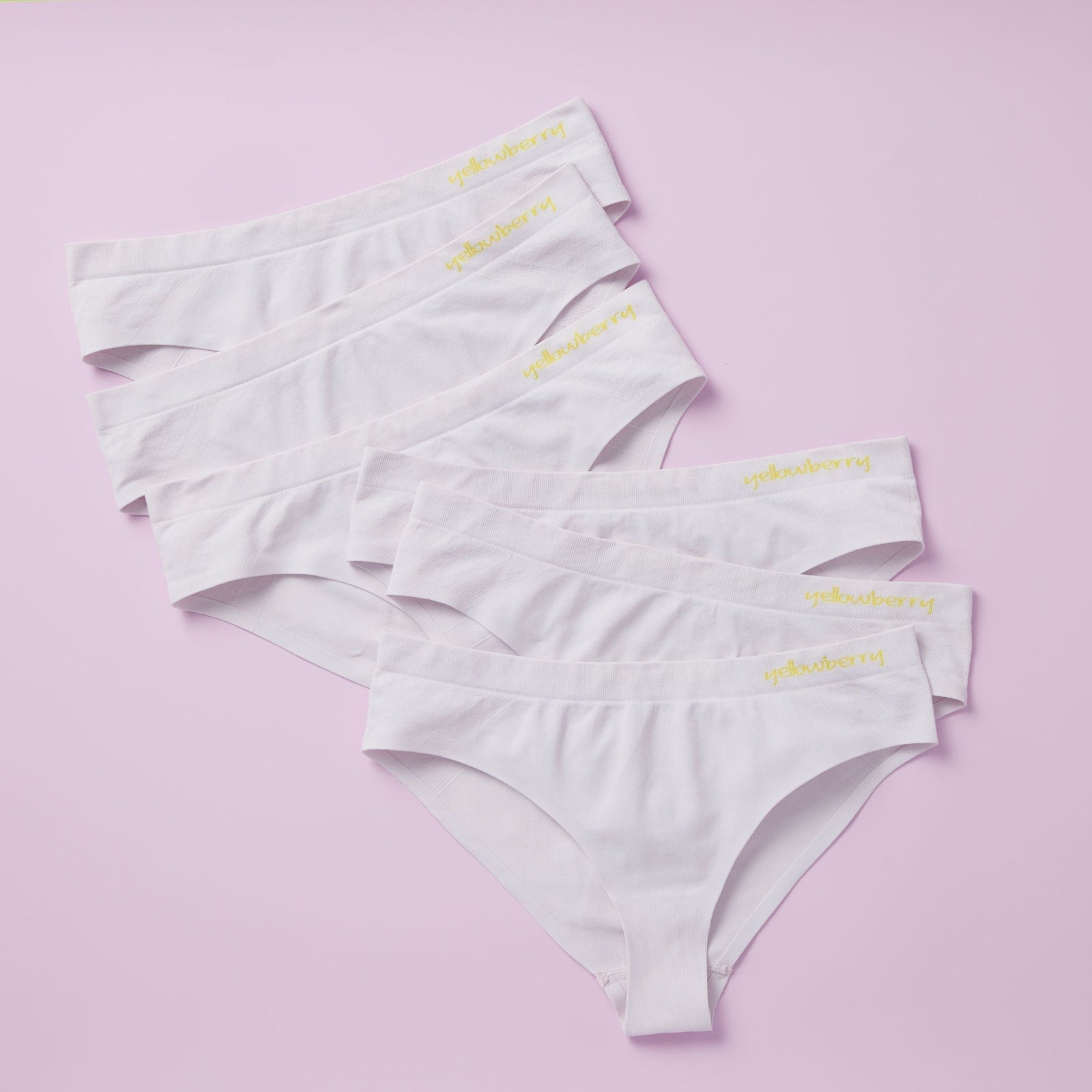 Image of 6 pair of pale lilac seamless underwear on a light purple background