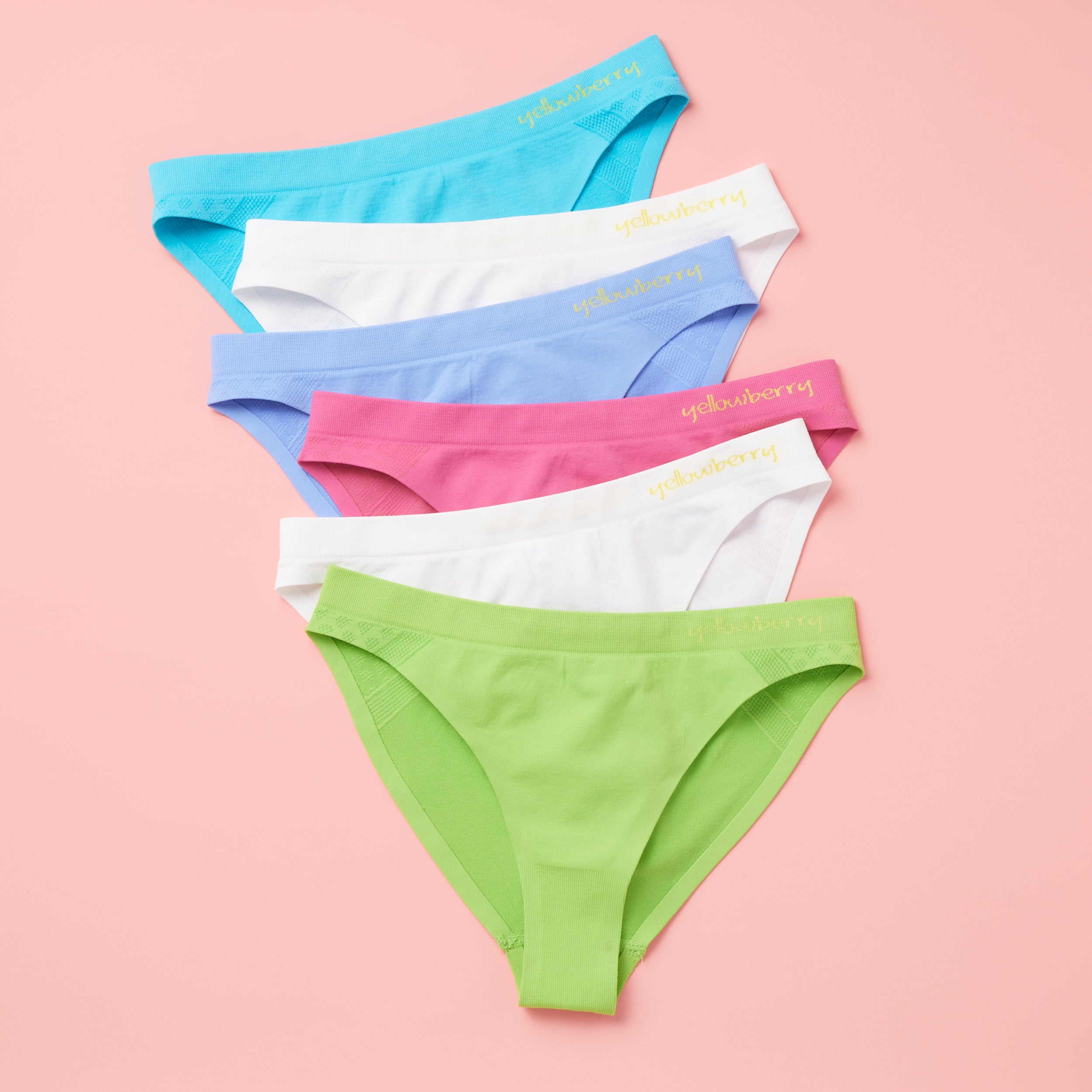 The Yellowberry commitment to excellence doesn't end with the product itself. As a female-founded brand, we're passionate about empowering girls and reducing our environmental footprint. That's why we've implemented sustainable practices throughout our supply chain, utilizing leftover fabric to create reusable fabric bags for packaging is just another way we're making a positive impact on the world. Scout Watercolor front on peach