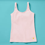 Laydown image of a light pink girls cotton tank top with a shelf bra on an aqua background, front