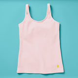 Laydown image of a light pink girls cotton tank top with a shelf bra on an aqua background, front