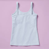 Laydown image of the back of a light blue cotton camisole with a shelf bra on a light purple background