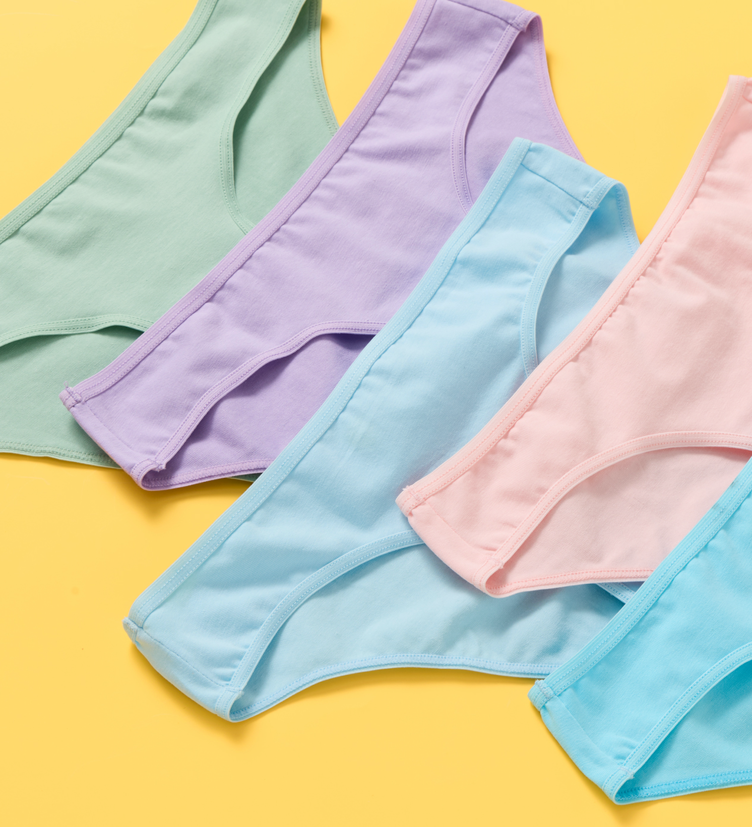 Colorful underwear on a yellow background