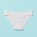 Yellowberry, The Original Brand for Girls, where meticulous detail meets exceptional quality for the best fit and fabric, all from a brand founded by girls who believe in empowering women and girls everywhere. Join us on our mission to inspire confidence, celebrate individuality, and redefine standards, one garment at a time. Simple Morning Mist Cotton Underwear front on blue background