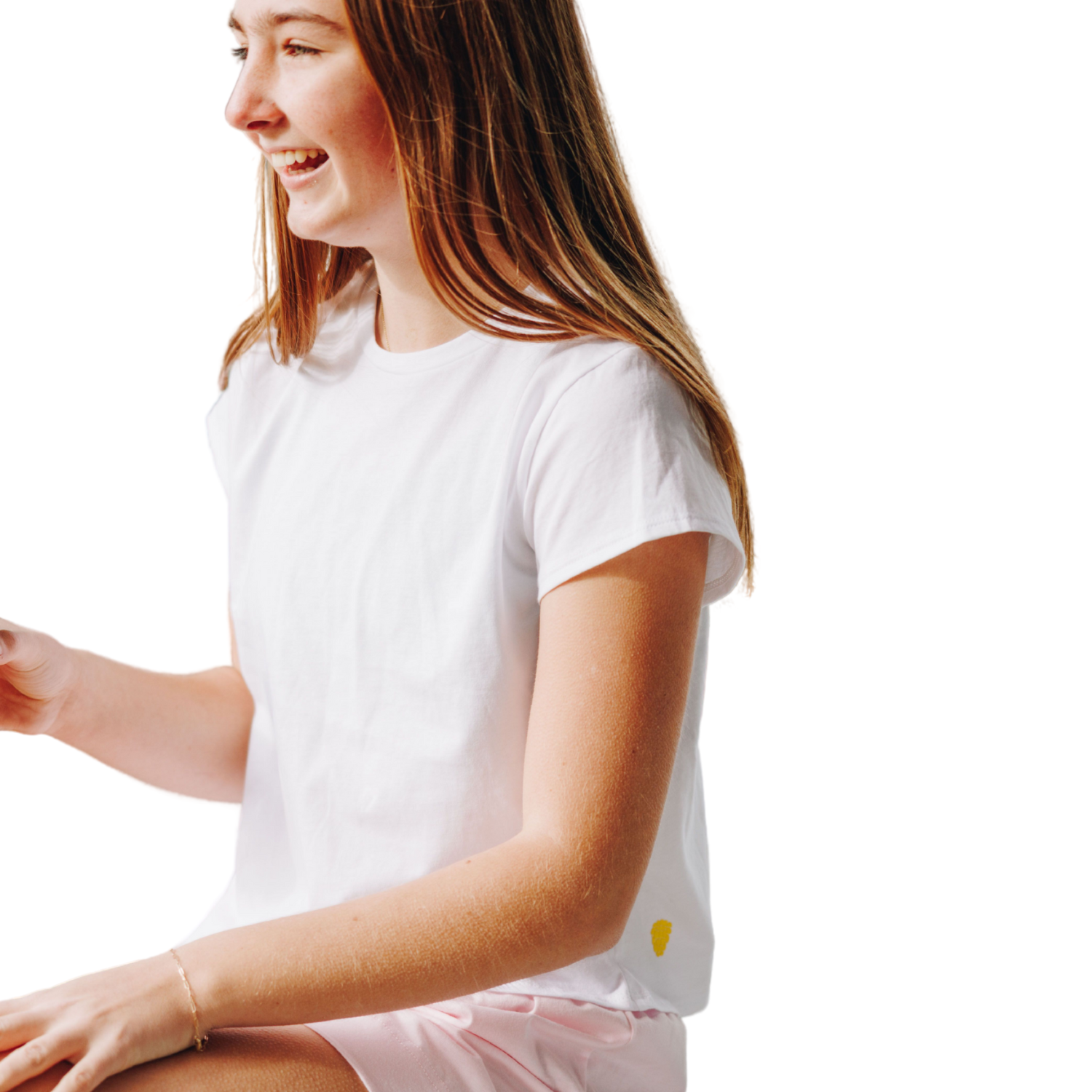 Made in California with 100% organic cotton Breeze Short Sleeve Tee showcases the quality and softness that define us. Colors were chosen with great care to create a look that feels both effortless and unique. Crafted in small batches by a family-owned factory, each piece reflects fine craftsmanship with an attention to detail that makes it truly special. Designed to coordinate or as stand-alone products, Girl wearing white marshmallow Yellowberry Cotton T-shirt