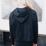 Yellowberry Downtown Hoodie in soft cotton, and effortless Style. Designed with a cross-front hood for subtle flair, it falls just below the navel, hitting the hip for a relaxed, effortless fit. Each piece in our lounge collection embodies chic, timeless style, all essentials you'll reach for all cozy season long. Made with pride in the USA, in colors thoughtfully chosen to mix and match seamlessly. We hope you enjoy them as much as we loved creating them for you. Starry Night detail from the back