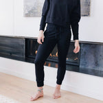 Yellowberry Downtown Hoodie in soft cotton, and effortless Style. Designed with a cross-front hood for subtle flair, it falls just below the navel, hitting the hip for a relaxed, effortless fit. Each piece in our lounge collection embodies chic, timeless style, all essentials you'll reach for all cozy season long. Made with pride in the USA, in colors thoughtfully chosen to mix and match seamlessly. We hope you enjoy them as much as we loved creating them for you. Starry Night with Uptown Jogger