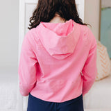 Yellowberry Downtown Hoodie in soft cotton, and effortless Style. Designed with a cross-front hood for subtle flair, it falls just below the navel, hitting the hip for a relaxed, effortless fit. Each piece in our lounge collection embodies chic, timeless style, all essentials you'll reach for all cozy season long. Made with pride in the USA, in colors thoughtfully chosen to mix and match seamlessly. We hope you enjoy them as much as we loved creating them for you. Hot Pink detail back