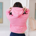 Yellowberry Downtown Hoodie in soft cotton, and effortless Style. Designed with a cross-front hood for subtle flair, it falls just below the navel, hitting the hip for a relaxed, effortless fit. Each piece in our lounge collection embodies chic, timeless style, all essentials you'll reach for all cozy season long. Made with pride in the USA, in colors thoughtfully chosen to mix and match seamlessly. We hope you enjoy them as much as we loved creating them for you. Hot Pink raising hood
