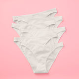 Yellowberry Petal Pima Cotton Bikini Underwear Bundle has a fuller coverage bottom. Made from luxurious Pima Cotton infused with a hint of Spandex, these undies provide the perfect amount of stretch for ultimate comfort and flexibility. The elastic waistband ensures a snug yet gentle fit, while the easy care instructions make laundry day a breeze. Snowflake White 6PK on pink front