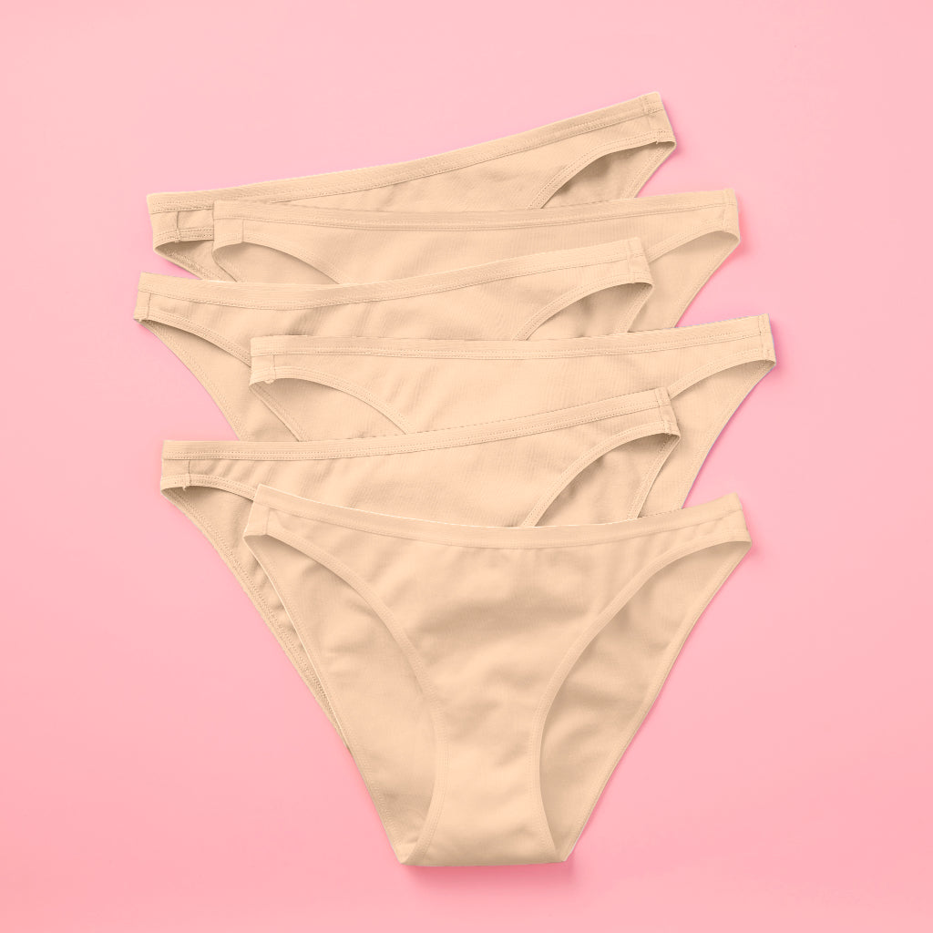 Yellowberry Petal Pima Cotton Bikini Underwear Bundle has a fuller coverage bottom. Made from luxurious Pima Cotton infused with a hint of Spandex, these undies provide the perfect amount of stretch for ultimate comfort and flexibility. The elastic waistband ensures a snug yet gentle fit, while the easy care instructions make laundry day a breeze. Doe 6PK on pink front