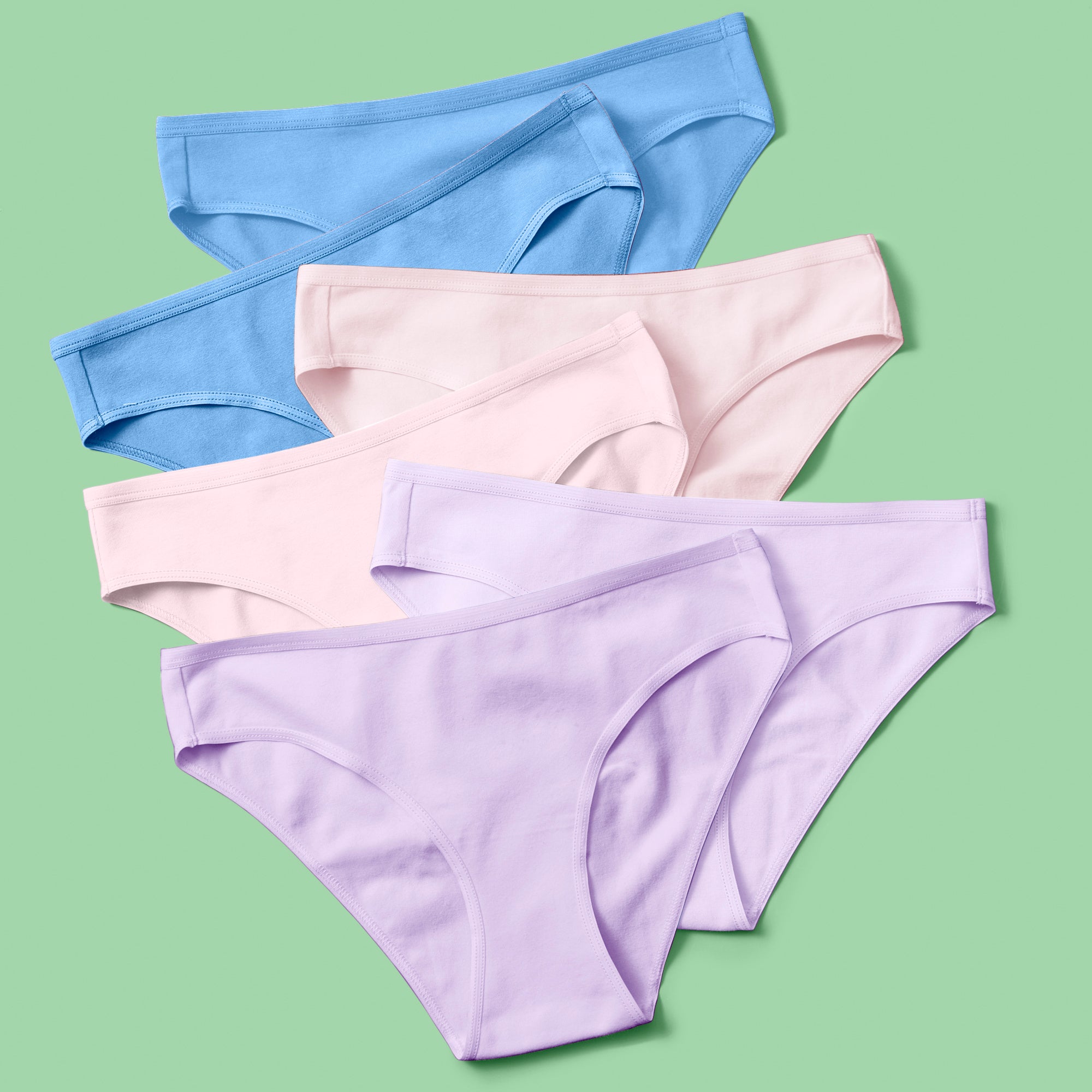 Yellowberry Simple Underwear In Multi front image on green background bundle 6PK of Pima Cotton Underwear, designed with the utmost care and critique from moms and daughters far and wide. With a full coverage bottom and soft cotton construction, this underwear is high quality and great all day comfort.