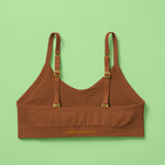 Our Tulip Bra is updated with softer and slightly thicker fabric, mocha, back. We added gentle ruching to allow room and support for development and growing girls. The Tulip bra is a fantastic option for all girls in search of an everyday, blissfully soft and comfortable addition to their top drawers.