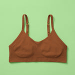 Our Tulip Bra is updated with softer and slightly thicker fabric, mocha, front. We added gentle ruching to allow room and support for development and growing girls. The Tulip bra is a fantastic option for all girls in search of an everyday, blissfully soft and comfortable addition to their top drawers.
