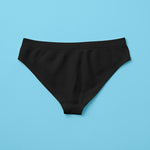 Yellowberry Twistr Seamless Underwear in Starry Night (black) on a blue background. These underwear are true seamless, high quality girls underwear and made with super soft fabrics. Girl and mom approved!