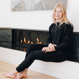 Yellowberry Uptown Jogger, where comfort meets effortless style. Inspired by lazy Sundays and forever being comfy. This cotton jogger is made with our beloved, lusciously soft cotton fabric. A thick, long lasting elastic band fits comfortably at the waist sewn with custom color matching drawstrings for added cohesiveness. With real, deep pockets and a sleek, flattering fit, they’re designed and manufactured in the USA. Black Starry Night sitting fireplace