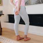 Yellowberry Uptown Jogger, where comfort meets effortless style. Inspired by lazy Sundays and forever being comfy. This cotton jogger is made with our beloved, lusciously soft cotton fabric. A thick, long lasting elastic band fits comfortably at the waist sewn with custom color matching drawstrings for added cohesiveness. With real, deep pockets and a sleek, flattering fit, they’re designed manufactured in the USA. Grey Morning Mist fireplace