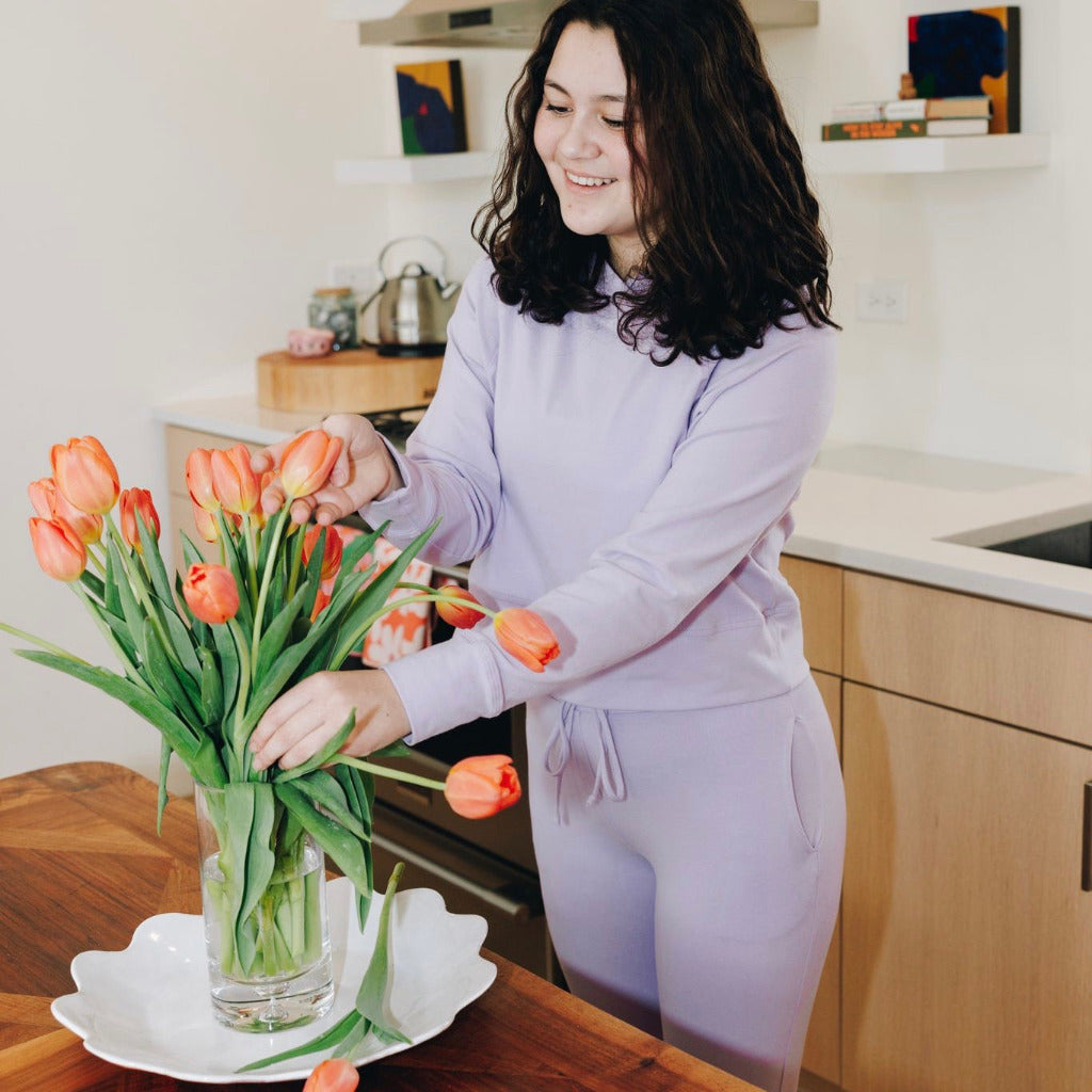 Yellowberry Uptown Jogger, where comfort meets effortless style. Inspired by lazy Sundays and forever being comfy. This cotton jogger is made with our beloved, lusciously soft cotton fabric. A thick, long lasting elastic band fits comfortably at the waist sewn with custom color matching drawstrings for added cohesiveness. With real, deep pockets and a sleek, flattering fit, they’re designed manufactured in the USA. Huckleberry Lavender Flowers