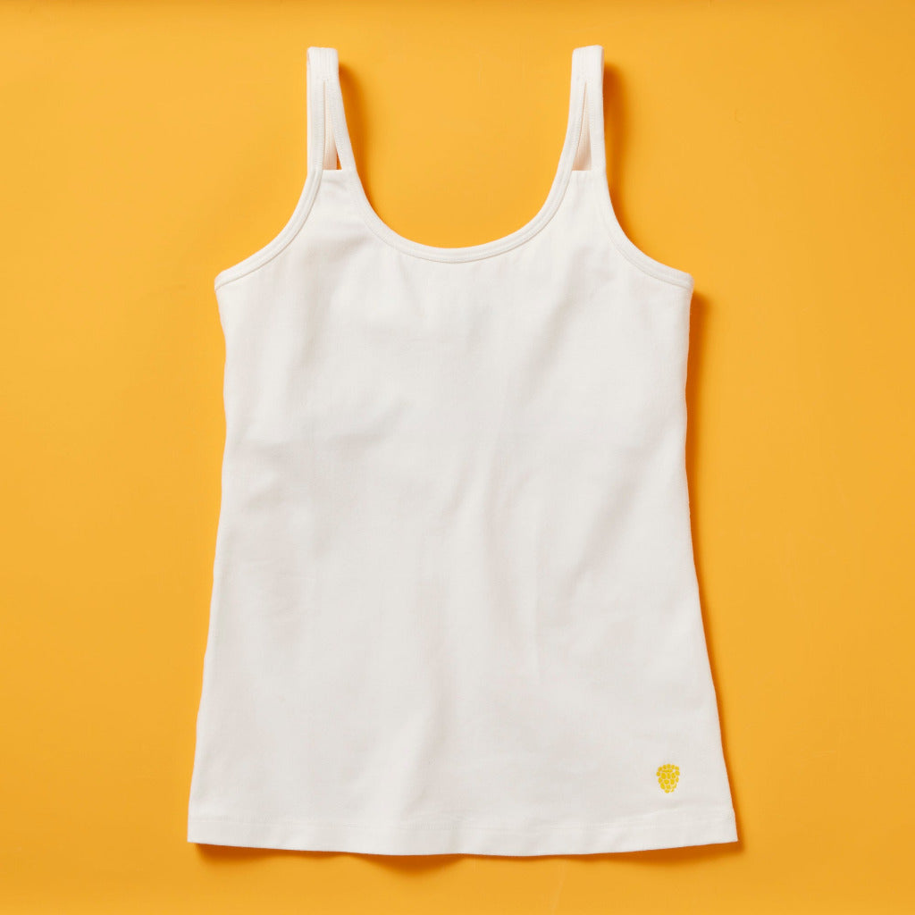 https://www.yellowberrycompany.com/cdn/shop/files/Yellowberry_shell_cotton_camisole_with_built_in_shelf_color_white_front_detail_image_ff2891c2-b4cf-48ea-9827-86e1509a8b3c_1200x.jpg?v=1700154216