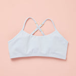 Light blue bra on a pink background