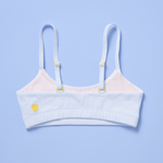 Yellowberry Pipit Raindrop training bra, back laydown with yellow logo and sliders, light blue on a blue background