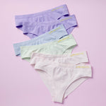 Best-Selling Twistr Girls Seamless Bikini cut underwear by Yellowberry. Front image of multi bundle on pink background. 
