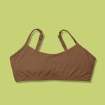 Front laydown detail image of Best-selling Yellowberry Ladybug Bra. The Absolute Best First Bra Ever Made. The Ladybug is our #1 best-selling bra for a reason. Built with a thicker, double layered cotton fabric, it ensures full coverage and support. All natural fabrics, incredibly soft. Anti microbial. Everyday bra for girls, tweens, and teens. Cotton fabric. Great for sensitive skin.