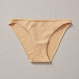 Yellowberry Petal Underwear are the epitome of comfort, style, and quality for your daughter's everyday wear. Crafted with meticulous attention to detail, these undies offer an impeccable fit and superior construction that will keep her feeling confident and comfortable all day long. Beige Doe front on natural linen