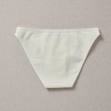 Yellowberry Petal Underwear are the epitome of comfort, style, and quality for your daughter's everyday wear. Crafted with meticulous attention to detail, these undies offer an impeccable fit and superior construction that will keep her feeling confident and comfortable all day long. Beach glass back on natural linen