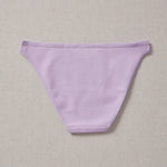 Yellowberry Petal Underwear are the epitome of comfort, style, and quality for your daughter's everyday wear. Crafted with meticulous attention to detail, these undies offer an impeccable fit and superior construction that will keep her feeling confident and comfortable all day long. Huckleberry Lavender back on natural linen