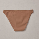 Yellowberry Petal Underwear are the epitome of comfort, style, and quality for your daughter's everyday wear. Crafted with meticulous attention to detail, these undies offer an impeccable fit and superior construction that will keep her feeling confident and comfortable all day long. Mocha brown back on natural linen