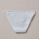 Yellowberry Petal Underwear are the epitome of comfort, style, and quality for your daughter's everyday wear. Crafted with meticulous attention to detail, these undies offer an impeccable fit and superior construction that will keep her feeling confident and comfortable all day long. Raindrop Light Blue back on natural linen