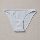 Yellowberry Petal Underwear are the epitome of comfort, style, and quality for your daughter's everyday wear. Crafted with meticulous attention to detail, these undies offer an impeccable fit and superior construction that will keep her feeling confident and comfortable all day long. Raindrop Light Blue front on natural linen