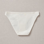 Yellowberry Petal Underwear are the epitome of comfort, style, and quality for your daughter's everyday wear. Crafted with meticulous attention to detail, these undies offer an impeccable fit and superior construction that will keep her feeling confident and comfortable all day long. Snowflake back on natural linen