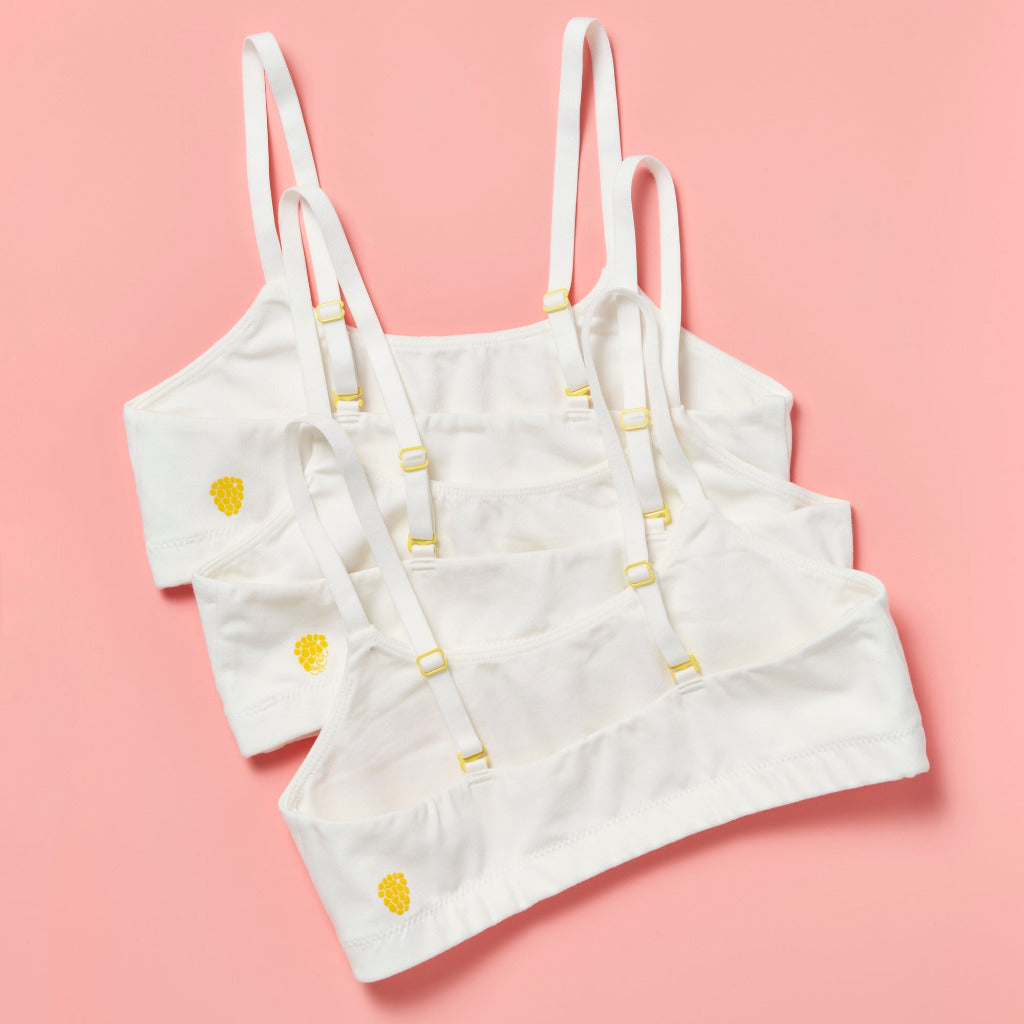 Yellowberry Pipit First Bra Bundle. Three white super soft training bra for girls. Created by a female founded, female owned company.