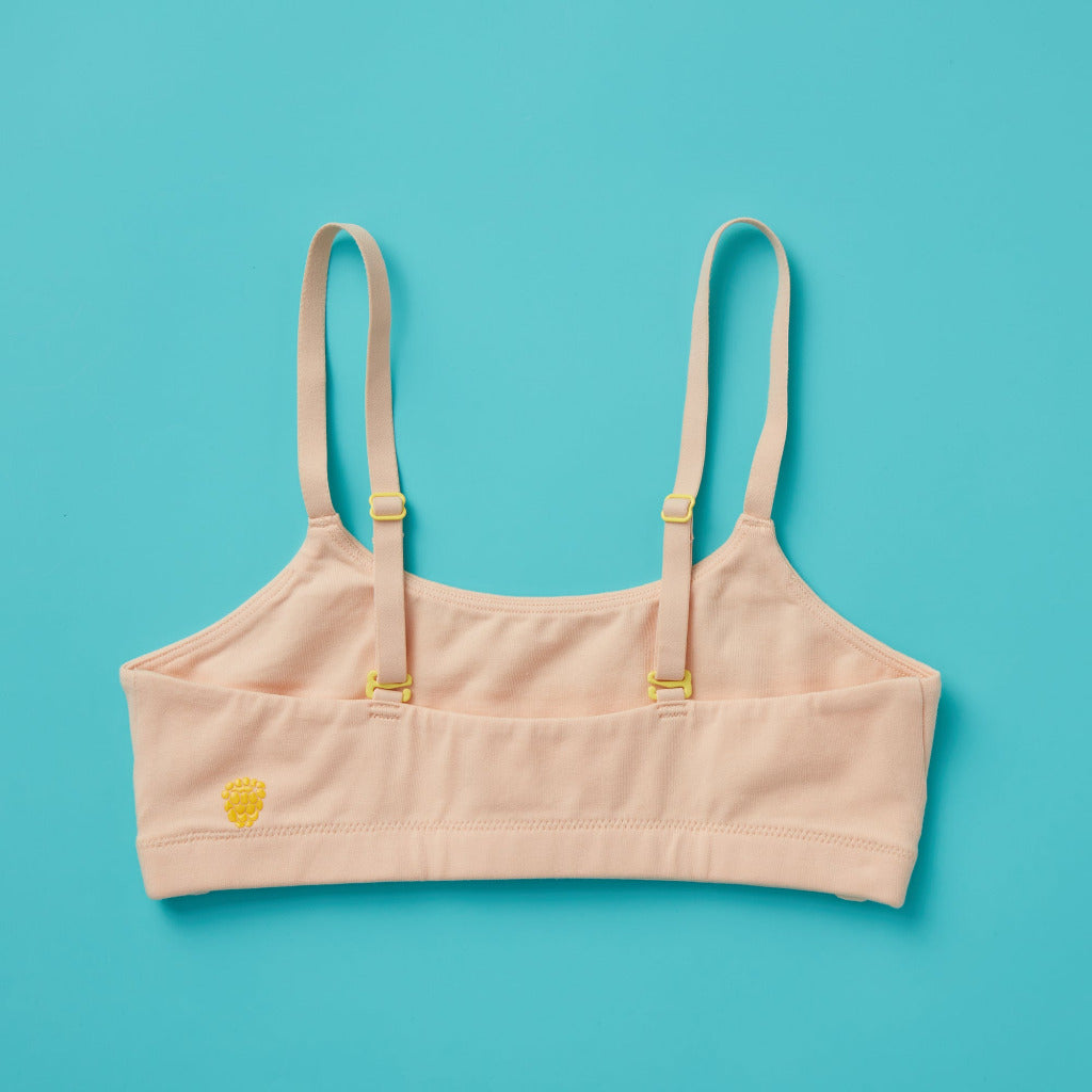 Yellowberry Pipit First Training Bra. Super soft, all-natural cotton beginner bra. Supportive everyday bra with no underwires. High-quality, double-layered fabric. No padding. Designed for girls and daughters with sensitive skin. Machine wash, and dry