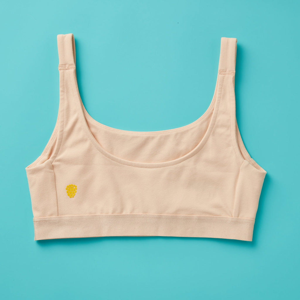 Yellowberry Scoop light to medium Bralette for girls, tweens, and teens. Made for lighter to medium activity (hiking, spinning, yoga, barre, etc.). Available in four neutral colors and extended sizes for all. 