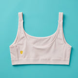 Yellowberry Scoop light to medium Bralette for girls, tweens, and teens. Made for lighter to medium activity (hiking, spinning, yoga, barre, etc.). Available in four neutral colors and extended sizes for all. 