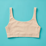Yellowberry Scoop light to medium Bralette for girls, tweens, and teens. Made for lighter to medium activity (hiking, spinning, yoga, barre, etc.). Available in four neutral colors and extended sizes for all. 