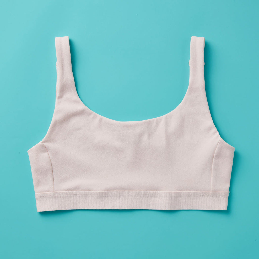 Yellowberry Scoop light to medium Bralette for girls, tweens, and teens. Made for lighter to medium activity (hiking, spinning, yoga, barre, etc.). Available in four neutral colors and extended sizes for all. 