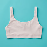 Yellowberry Scoop light to medium Bralette for girls, tweens, and teens. Made for lighter to medium activity (hiking, spinning, yoga, barre, etc.). Available in four neutral colors and extended sizes for all. 
