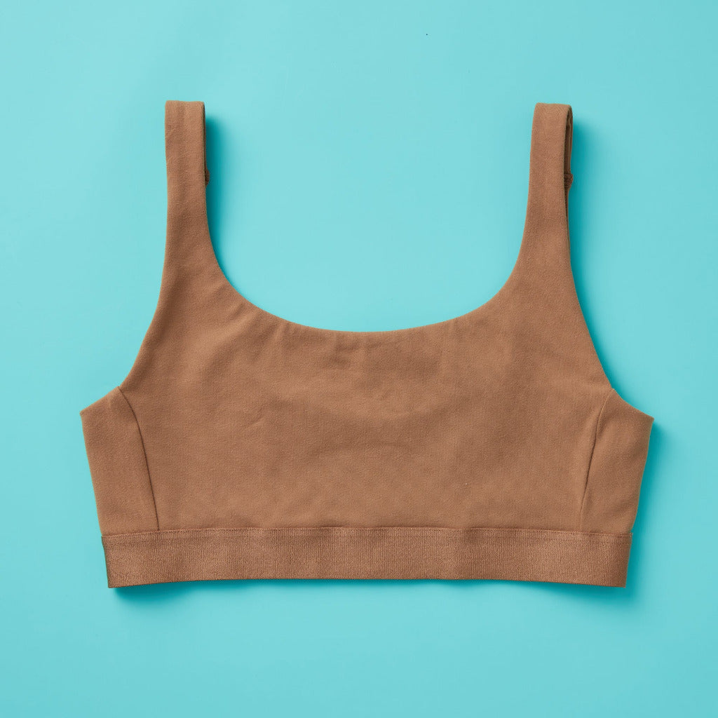 Yellowberry Scoop light to medium Bralette for girls, tweens, and teens. Made for lighter to medium activity (hiking, spinning, yoga, barre, etc.). Available in four neutral colors and extended sizes for all. 