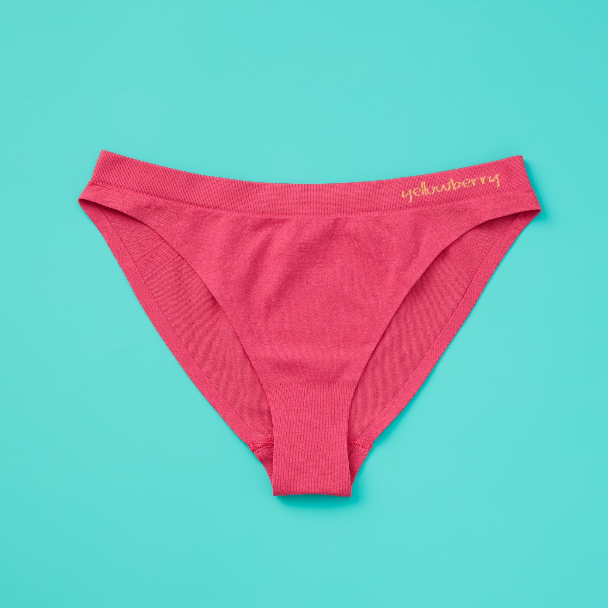 Yellowberry thought that the everyday underwear industry for girls needed a bit of innovation and quality, so we made it happen ourselves. Scout seamless underwear with bonded legs are designed for complete comfort all day, every day, with a price point that agrees with parents just as well as it fits. A perfect underwear for girls of all ages. Hot Pink on turquoise front