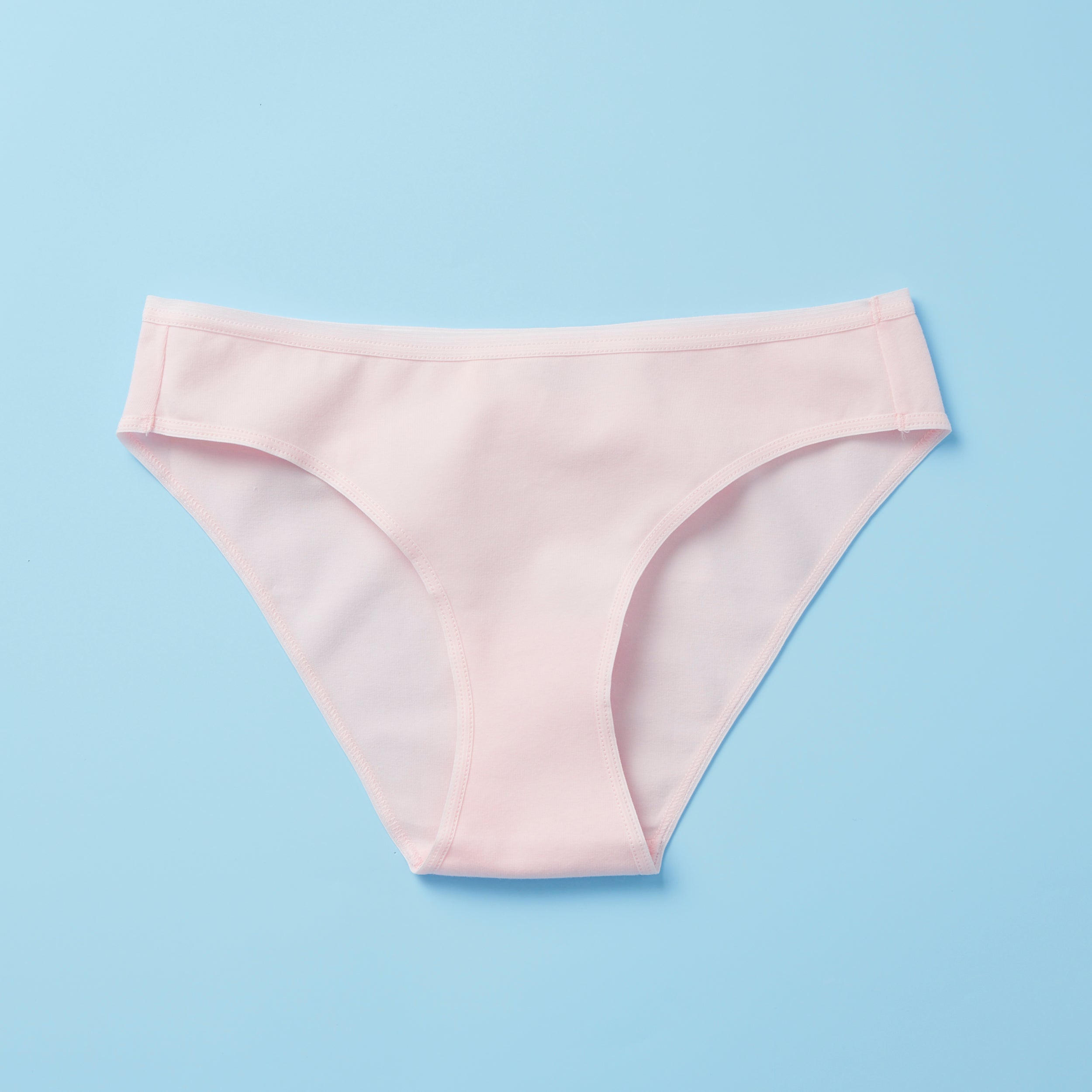 Yellowberry, The Original Brand for Girls, where meticulous detail meets exceptional quality for the best fit and fabric, all from a brand founded by girls who believe in empowering women and girls everywhere. Join us on our mission to inspire confidence, celebrate individuality, and redefine standards, one garment at a time. Simple Bubblegum front on light blue background