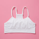 The Ultimate Seamless Racerback Girls Bra - Your Daughter's First Choice for Everyday Comfort! Are you searching for the perfect seamless bra for your growing girl? Look no further! Our girls' seamless racerback bra is meticulously designed with superior features to ensure unbeatable comfort and support, making it the ideal choice for her first bras and everyday wear. Snowflake front image on pink background.