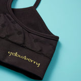 The Ultimate Seamless Racerback Girls Bra - Your Daughter's First Choice for Everyday Comfort! Are you searching for the perfect seamless bra for your growing girl? Look no further! Our girls' seamless racerback bra is meticulously designed with superior features to ensure unbeatable comfort and support, making it the ideal choice for her first bras and everyday wear. Starry Night detail image on mint green background.