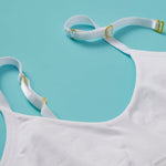 Detail image of the front of our Tulip Seamless Bra for girls in Snowflake (white). Our Tulip Bra is updated with softer and slightly thicker fabric. We added gentle ruching to allow room and support for development and growing girls. The Tulip bra is a fantastic option for all girls in search of an everyday, blissfully soft and comfortable addition to their top drawers.