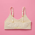 Our Tulip Bra is updated with softer and slightly thicker fabric, doe (beige) back. We added gentle ruching to allow room and support for development and growing girls. The Tulip bra is a fantastic option for all girls in search of an everyday, blissfully soft and comfortable addition to their top drawers.